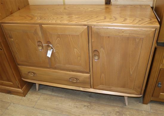 An Ercol Windsor light elm sideboard W.114cm